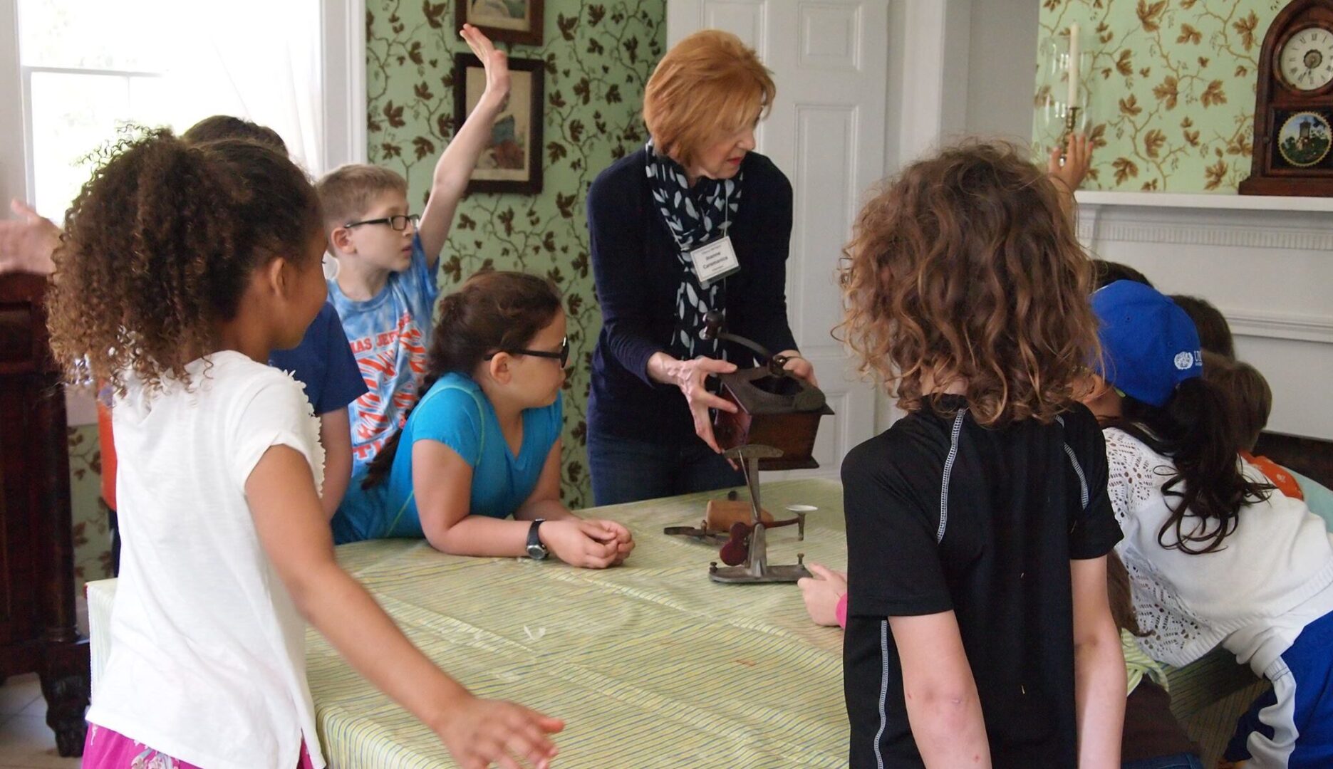 A group of kids around a table.